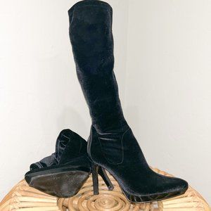 Black, faux crushed velvet knee high boots with stiletto heel